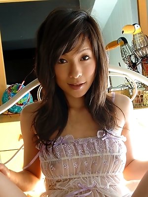 Lovely Asian model has a tight hairy pussy and a firm ass and tits to fuck