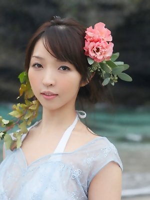 Neo Asian babe in see through dress is like goddess from ocean